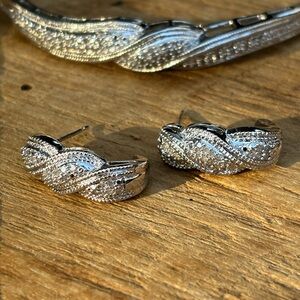 Pure silver over br. 4 piece set. Earrings, Ring, bangle, and pendant. Item 49